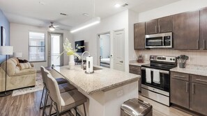 Fridge, dining tables - Landing | Stunning 2BD, Yoga Studio, Gym (Arlington)