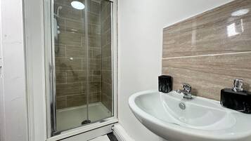 Hair dryer, towels, toilet paper