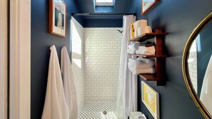 Shower, hair dryer, towels, soap