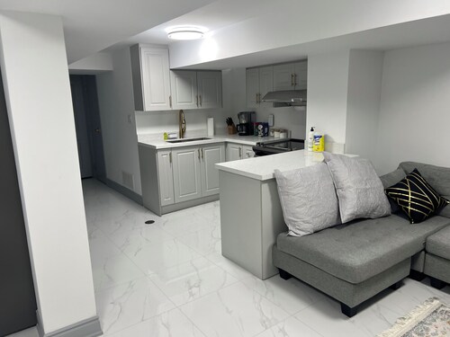 Stylish 1BR + Den Apartment | Sleeps 5 | Separate Ent. & Comfort with Parking