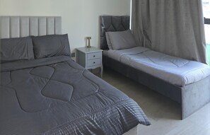 2 habitaciones, tabla de planchar con plancha, wifi y ropa de cama 