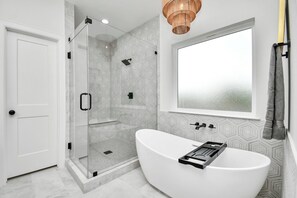 Shower, eco-friendly toiletries, hair dryer, bidet