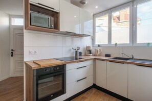 Réfrigérateur, micro-ondes, four, lave-vaisselle