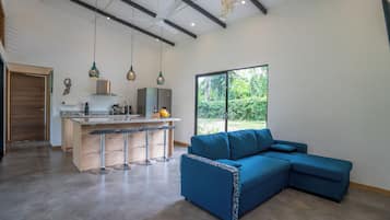 Vila conforto, 2 quartos, varanda, vista para o jardim | Área de estar