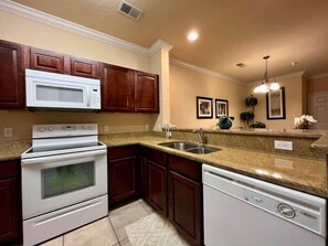 Microwave, oven, stovetop, dishwasher - Champions Gate & Disney area Resort Dream Condo (Davenport)