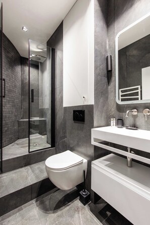 Shower, hair dryer, towels, soap