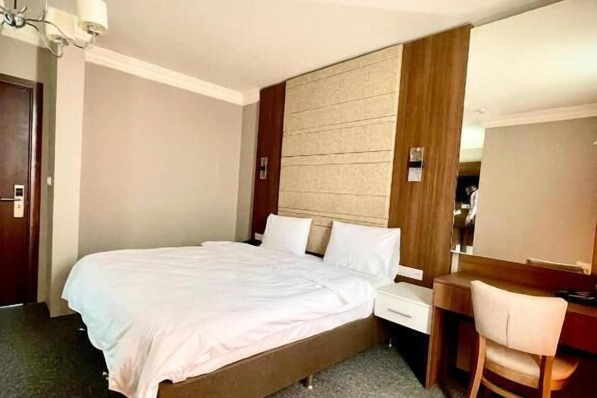 Standard Double Room, 1 Queen Bed, City View | Individually decorated, individually furnished, desk, laptop workspace