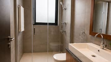 Combined shower/bathtub, free toiletries, hair dryer, bathrobes