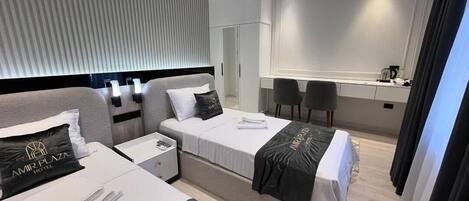 Twin Room, City View | In-room safe, desk, laptop workspace, blackout drapes