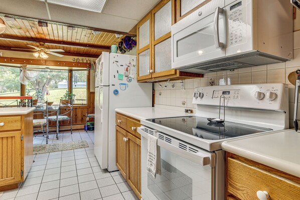 Fridge, microwave, stovetop, coffee/tea maker