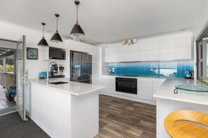 Fridge, microwave, dishwasher, coffee/tea maker