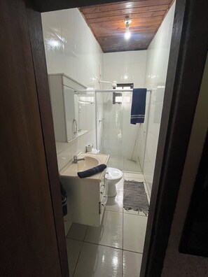 Shower, towels, soap, toilet paper