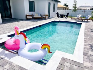 A heated pool - Beautiful Cape Coral Getaway with Sparkling Pool & Relaxing Outdoor Space! (Cape Coral)