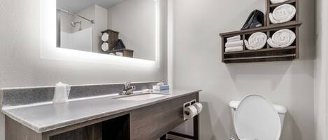 Hair dryer, towels, soap, shampoo