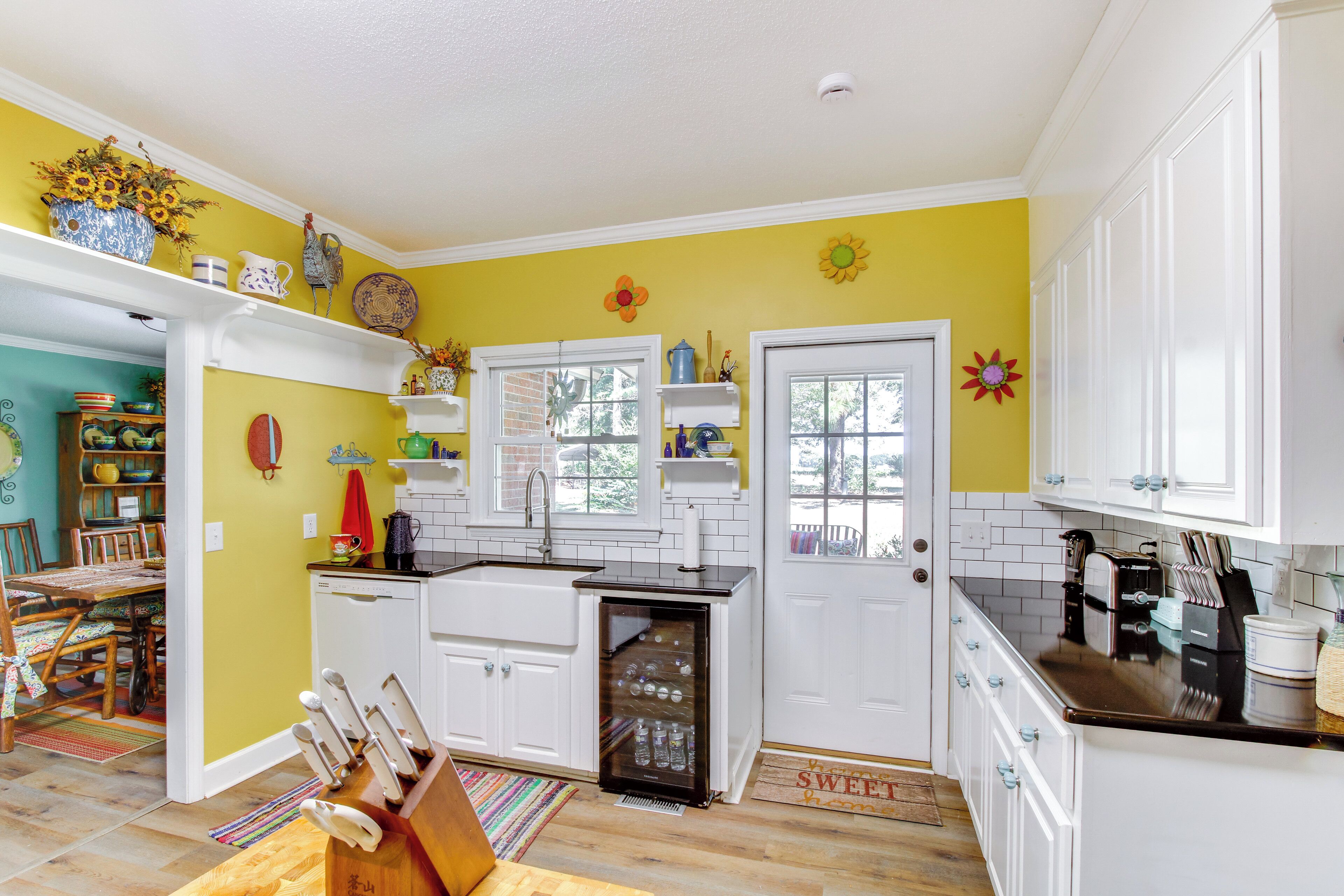 Fridge, stovetop, dishwasher, coffee/tea maker