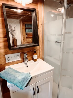 Shower, towels, soap, shampoo