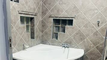 Hair dryer, towels, soap, toilet paper