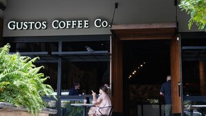 A coffee shop named 'Gustos Coffee Co.' with outdoor seating and a visible entrance. - Apt B, Sunny San Juan Getaway (San Juan)