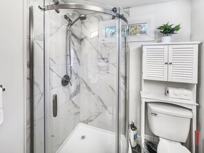 Shower, hair dryer, towels, soap
