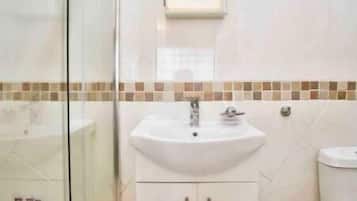 Hair dryer, towels, soap, toilet paper
