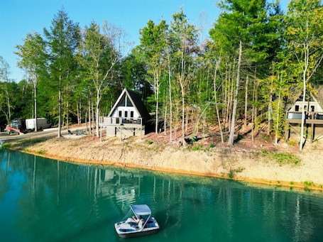 Exterior. Luxury Tiny Cabin on Pond w/ Hot Tub, Loft & Resort Game Room – 20 Mins to Red River Gorge