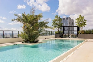 Outdoor pool, open 7:00 AM to 7:00 PM, pool umbrellas, sun loungers