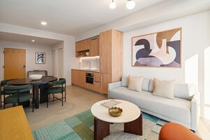 65-inch flat-screen TV with cable channels