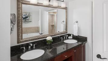 Jetted tub, hair dryer, towels, soap