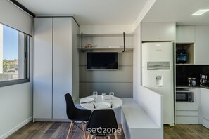 Apartment | Private kitchen - Complete and Modern Accommodations in a Building With gym - MCP (Porto Alegre)