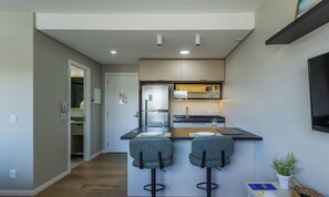 Basic Apartment | Private kitchen - Complete and Modern Accommodations in a Building With gym - MCP (Porto Alegre)