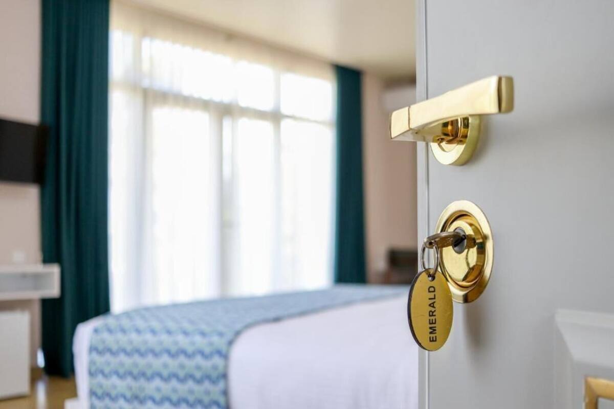 Deluxe Double or Twin Room, Balcony | In-room safe, blackout curtains, soundproofing, free WiFi