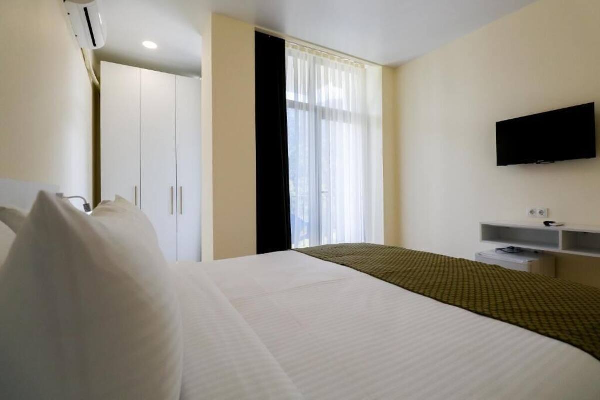 Economy Double Room, Balcony | In-room safe, blackout curtains, soundproofing, free WiFi