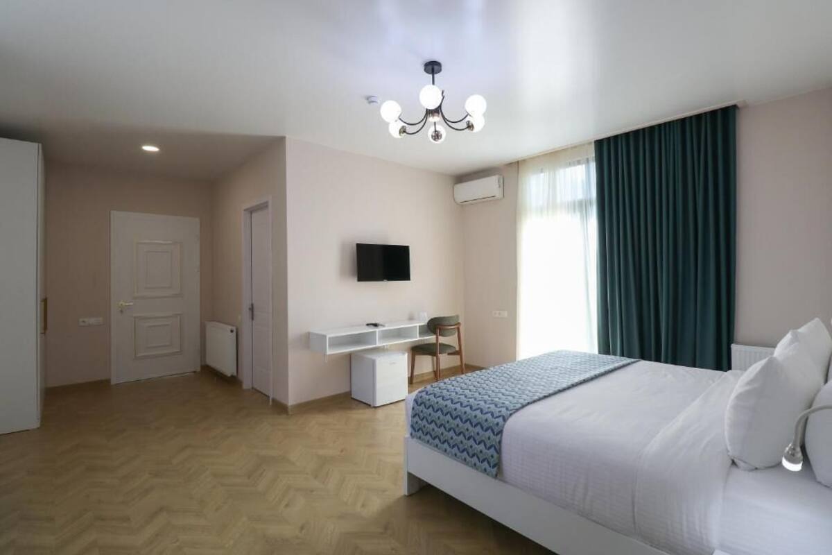 Standard Triple Room, Balcony | In-room safe, blackout curtains, soundproofing, free WiFi