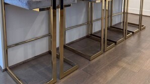 A series of metal-framed tables with grey tops and no visible furnishings. - Cozy & Luxury 3BR for Families, Nurses & Groups (Houston)