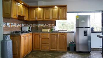 Appartement Deluxe, patio, vue ville | Cuisine privée