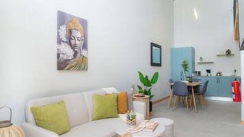 Deluxe Apartment, Patio | Living area