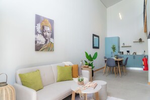 Apartamento Deluxe, patio | Zona de estar