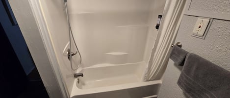 Hair dryer, towels, soap, shampoo