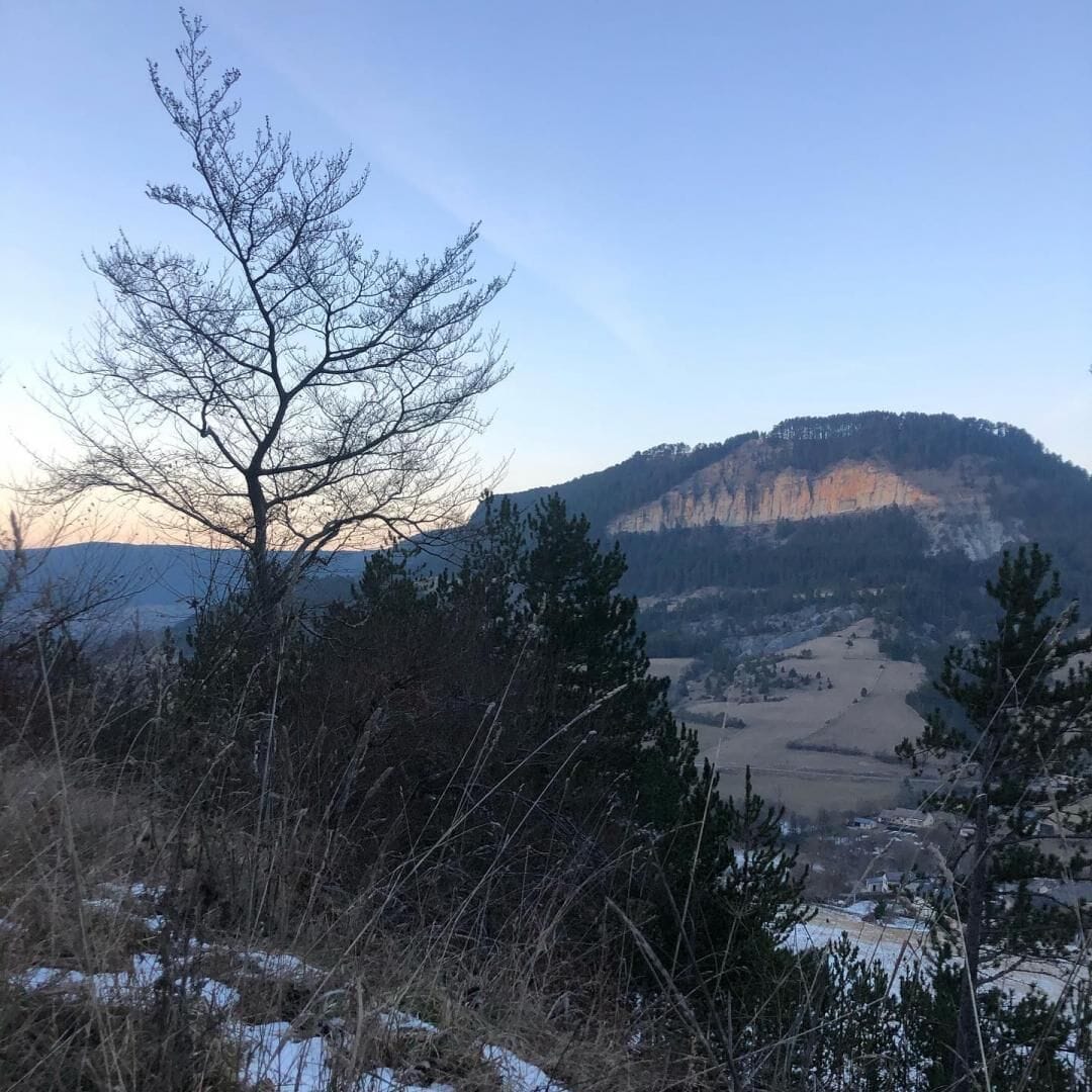 A mountainous landscape with a clear sky.