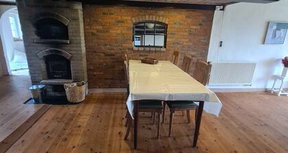 Holiday in a cozy farmhouse with horses