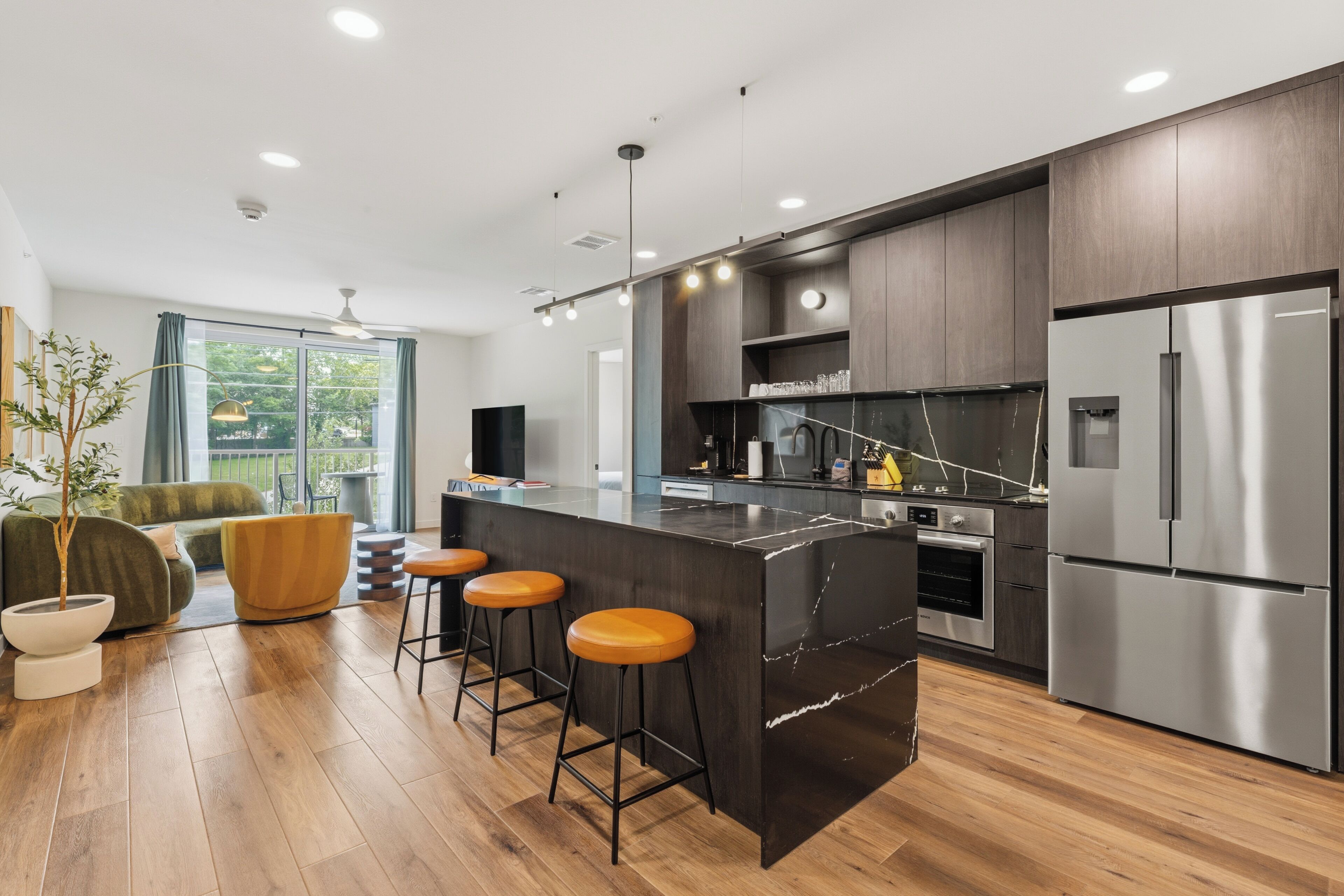 2 Bedroom Deluxe Suite w/ Balcony | Private kitchen | Fridge, microwave, oven, stovetop