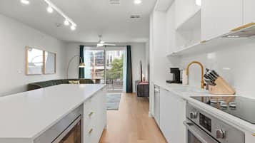 2 Bedroom Deluxe Suite w/ Balcony | Private kitchen | Coffee/tea maker, fridge, microwave, oven