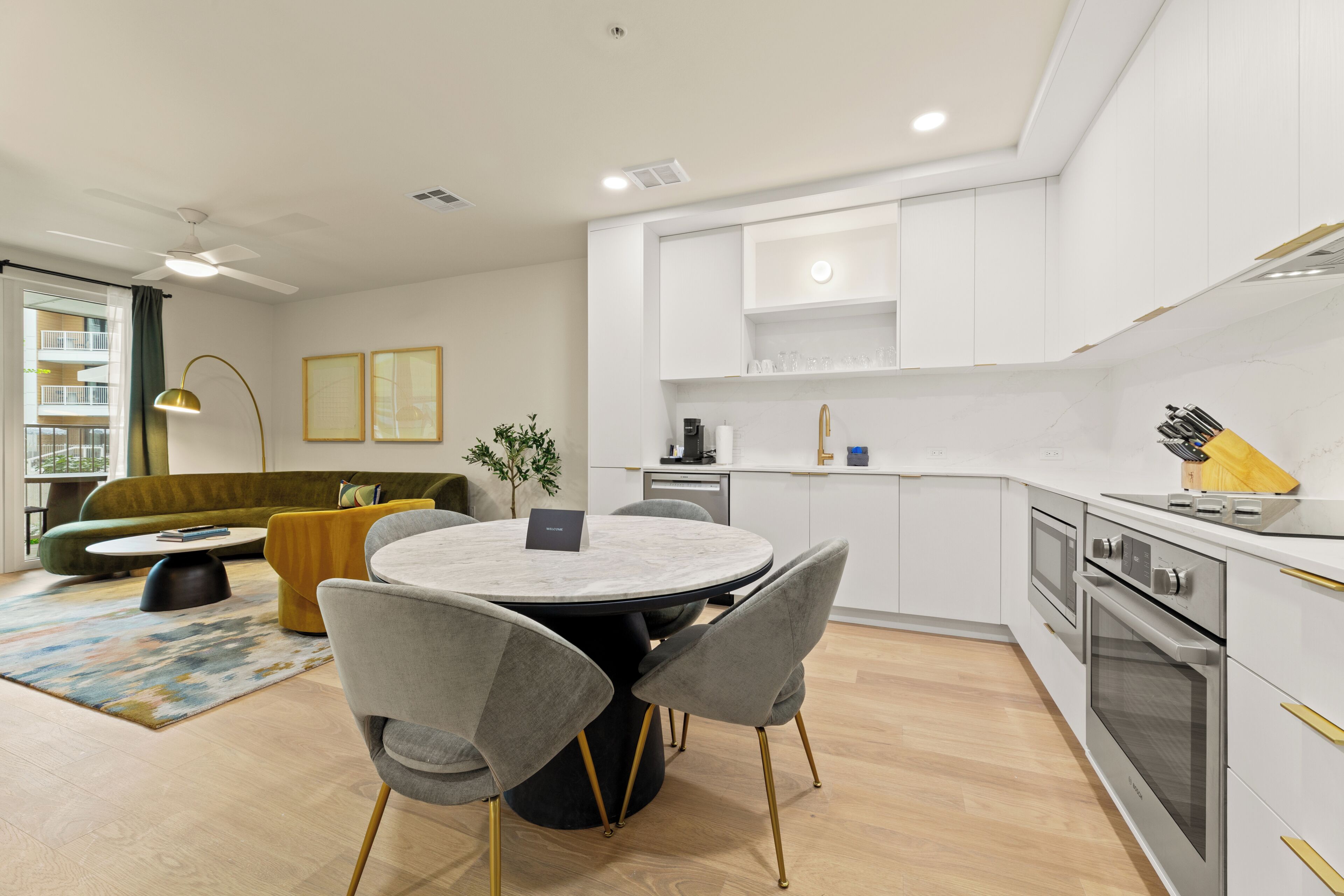 2 Bedroom Executive Suite w/ Balcony | Private kitchen | Fridge, microwave, oven, stovetop