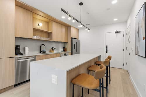 1 Bedroom Superior Suite w/ Balcony | Private kitchen | Fridge, microwave, oven, stovetop