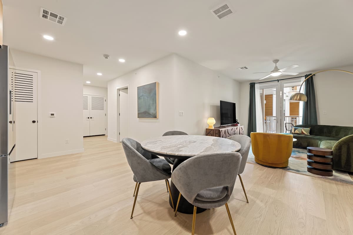 2 Bedroom Executive Suite w/ Balcony | Living area | 55-inch Smart TV with digital channels