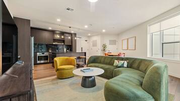 2 Bedroom Superior Suite w/ Balcony | Living area | 55-inch Smart TV with digital channels