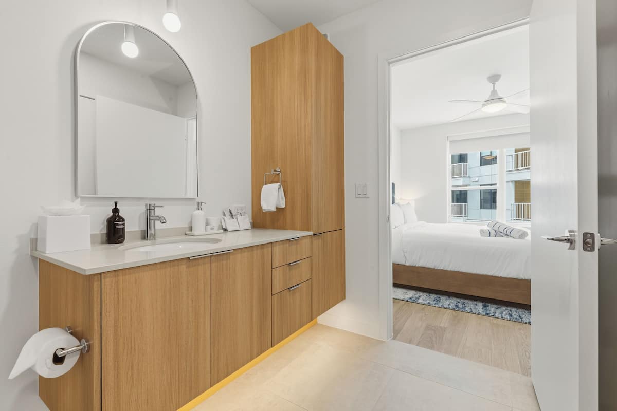 1 Bedroom Deluxe Suite w/ Balcony | Desk, laptop workspace, free WiFi