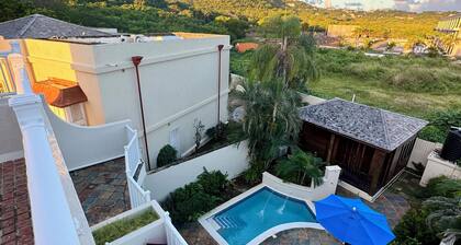 Breathtaking villa with private pool and hot tub, 2 minute walk from the beach.