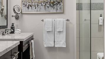 Shower, eco-friendly toiletries, hair dryer, towels