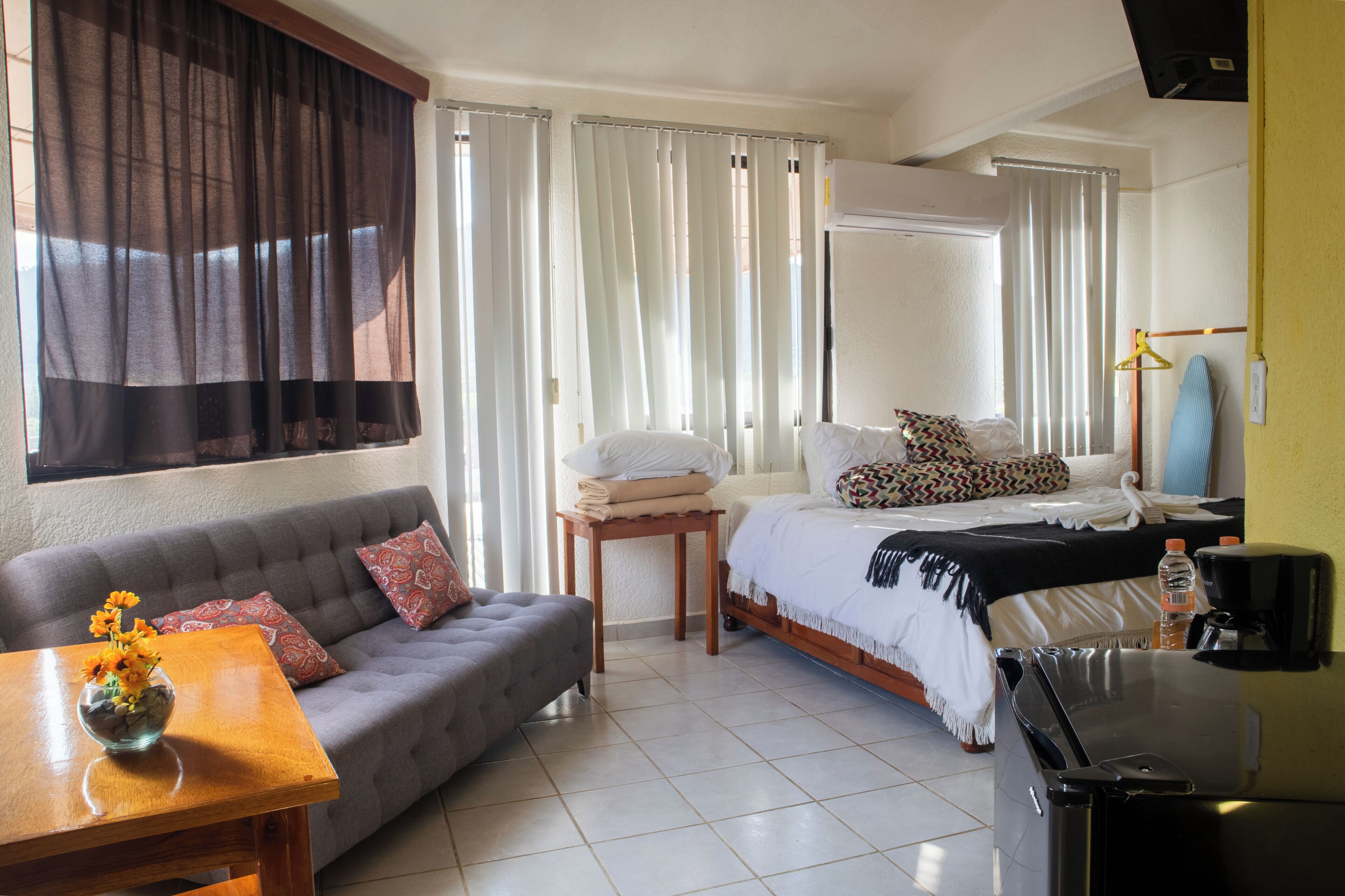 Junior Suite, City View | Desk, blackout drapes, iron/ironing board, free WiFi